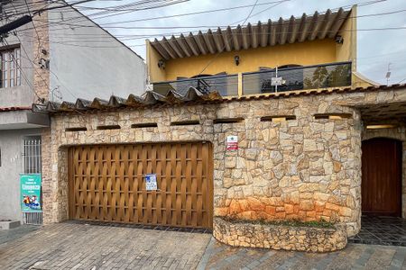 Casa à venda com 243m², 3 quartos e 3 vagasFachada + plaquinha