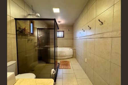 Casa à venda com 323m², 3 quartos e 2 vagasbanheiro 1