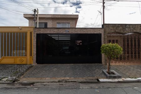 Casa à venda com 148m², 3 quartos e 2 vagas Casa à venda com 148m², 3 quartos e 2 vagasFachada