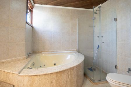 Casa de condomínio à venda com 166m², 3 quartos e 2 vagasBanheiro da Suíte