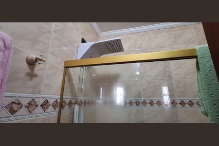 Casa à venda com 350m², 4 quartos e 4 vagasBanheiro Suíte 2