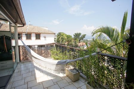 Casa de condomínio à venda com 396m², 4 quartos e 2 vagas Casa de condomínio à venda com 396m², 4 quartos e 2 vagasVaranda da Suíte 4