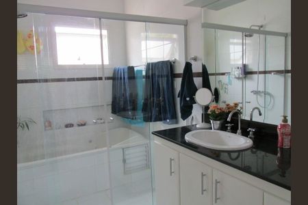 Casa de condomínio à venda com 409m², 4 quartos e 3 vagas