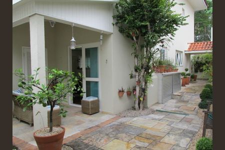 Casa de condomínio à venda com 409m², 4 quartos e 3 vagas