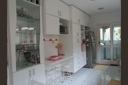 Casa de condomínio à venda com 409m², 4 quartos e 3 vagas