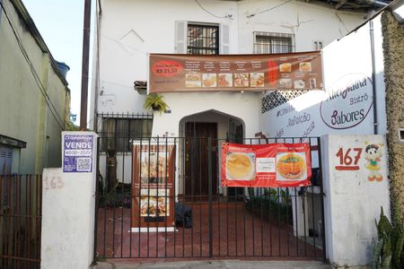 Casa à venda com 135m², 4 quartos e 1 vagaFachada e placa