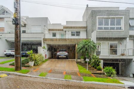 Casa de condomínio à venda com 196m², 3 quartos e 4 vagas Casa de condomínio à venda com 196m², 3 quartos e 4 vagasFachada