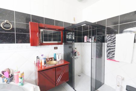 Casa à venda com 450m², 4 quartos e 4 vagas Casa à venda com 450m², 4 quartos e 4 vagasBanheiro da Suíte 1