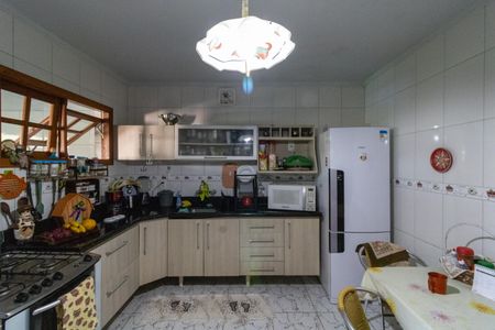 Casa à venda com 132m², 3 quartos e 3 vagas Casa à venda com 132m², 3 quartos e 3 vagasCozinha
