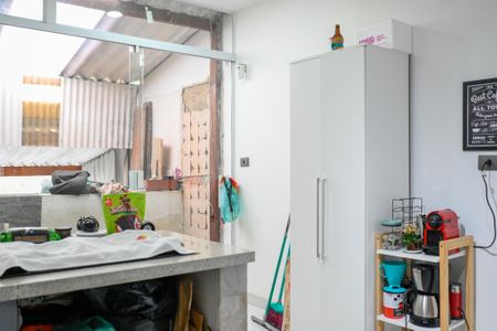 Casa à venda com 118m², 2 quartos e 2 vagas Casa à venda com 118m², 2 quartos e 2 vagasCozinha