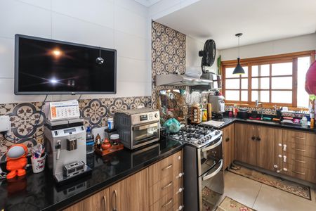 Casa à venda com 110m², 2 quartos e 2 vagas Casa à venda com 110m², 2 quartos e 2 vagasCozinha