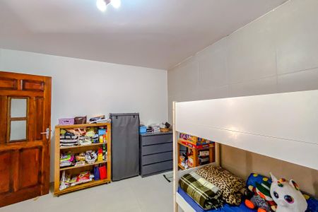 Casa à venda com 411m², 5 quartos e 6 vagasQuarto 2 (Casa 2)