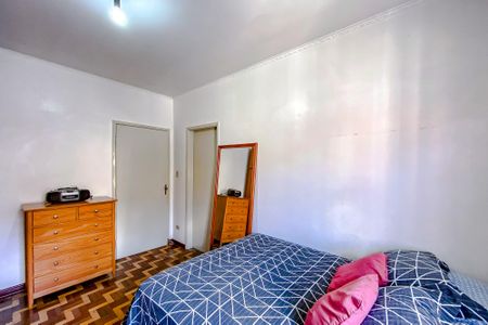 Casa à venda com 411m², 5 quartos e 6 vagasQuarto 1 - Suíte