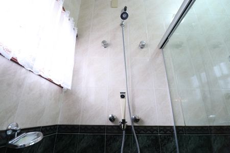 Casa à venda com 342m², 4 quartos e 3 vagasBanheiro da Suíte 1