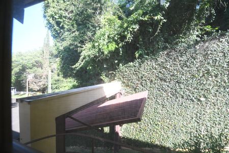 Casa de condomínio à venda com 420m², 4 quartos e 7 vagasÁrea de Serviço - Vista