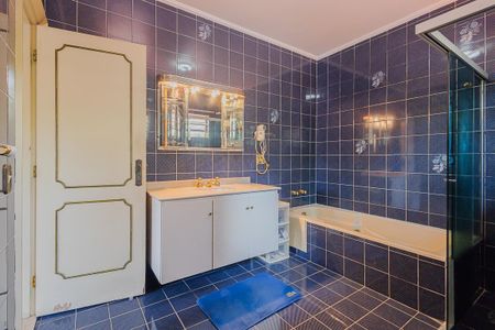 Casa à venda com 457m², 4 quartos e 4 vagasBanheiro da Suíte 1