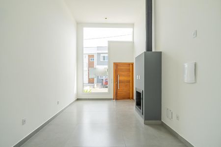 Casa de condomínio à venda com 102m², 3 quartos e 2 vagasSala