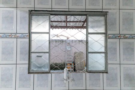 Casa à venda com 130m², 3 quartos e 5 vagas Casa à venda com 130m², 3 quartos e 5 vagasVista para a área de serviço da cozinha