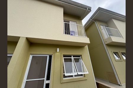 Casa de condomínio à venda com 77m², 2 quartos e 2 vagasFachada