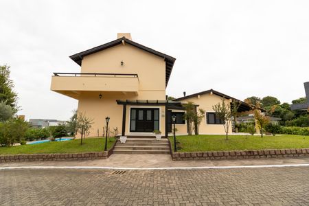 Casa de condomínio para alugar com 455m², 4 quartos e 2 vagas Casa de condomínio para alugar com 455m², 4 quartos e 2 vagasFachada