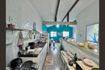 Casa de condomínio à venda com 240m², 2 quartos e 2 vagasCozinha e Área de Serviço