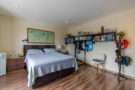 Casa de condomínio à venda com 522m², 4 quartos e 4 vagas Casa de condomínio à venda com 522m², 4 quartos e 4 vagasSuíte 3