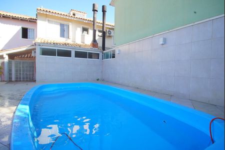 Casa de condomínio à venda com 78m², 2 quartos e 1 vagaÁrea Comum - Piscina