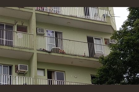 Apartamento à venda com 62m², 2 quartos e 1 vagaFachada + Placa