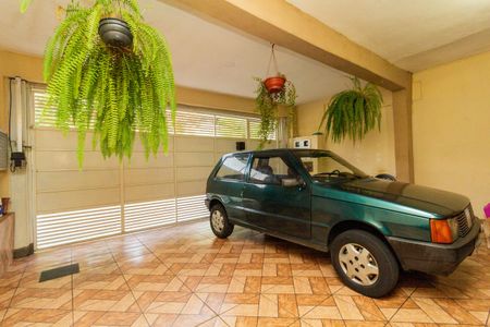 Casa à venda com 130m², 4 quartos e 1 vaga Casa à venda com 130m², 4 quartos e 1 vagaGaragem