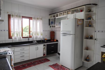 Casa à venda com 200m², 3 quartos e 4 vagas Casa à venda com 200m², 3 quartos e 4 vagasCozinha