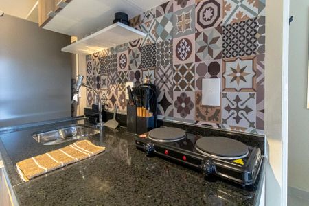 Studio à venda com 30m², 1 quarto e sem vaga Studio à venda com 30m², 1 quarto e sem vagaCozinha