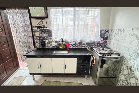 Casa à venda com 129m², 3 quartos e 3 vagas Casa à venda com 129m², 3 quartos e 3 vagasCozinha
