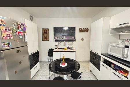 Casa à venda com 129m², 3 quartos e 3 vagas Casa à venda com 129m², 3 quartos e 3 vagasCozinha