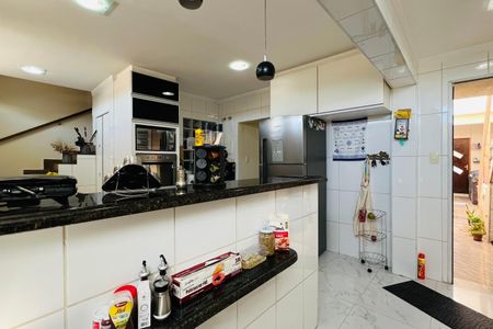Casa à venda com 126m², 3 quartos e 3 vagas Casa à venda com 126m², 3 quartos e 3 vagasCozinha