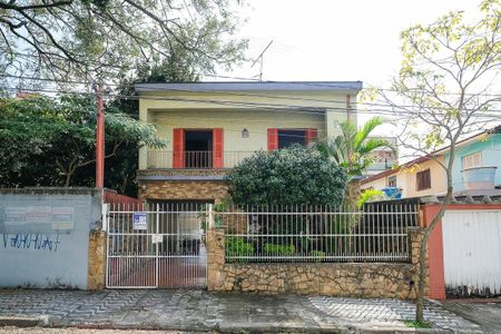 Casa à venda com 250m², 6 quartos e 2 vagasFachada + plaquinha