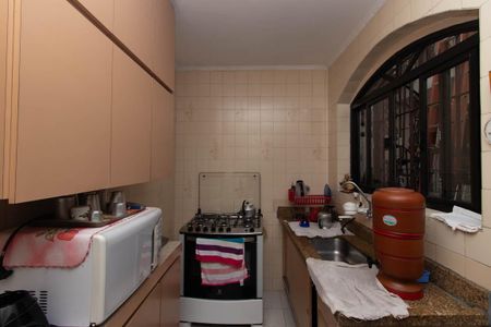 Casa à venda com 170m², 3 quartos e 3 vagas Casa à venda com 170m², 3 quartos e 3 vagasCozinha