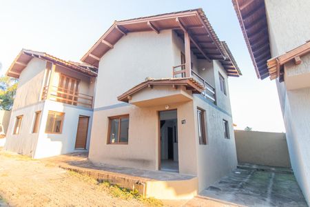 Casa de condomínio à venda com 130m², 2 quartos e 2 vagas Casa de condomínio à venda com 130m², 2 quartos e 2 vagasFachada
