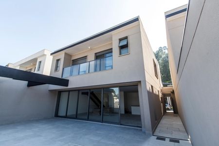 Casa de condomínio à venda com 415m², 4 quartos e 4 vagasFachada