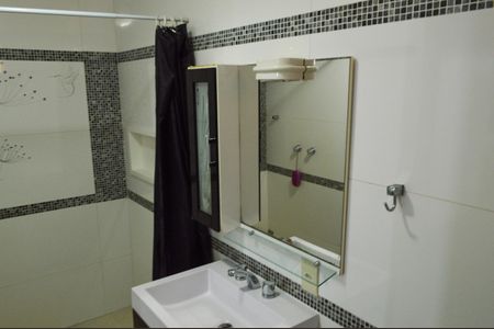 Casa de condomínio para alugar com 600m², 4 quartos e 2 vagasBanheiro da Suíte 1