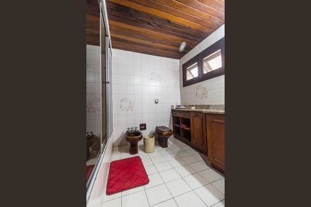 Casa de condomínio à venda com 220m², 3 quartos e 3 vagas Casa de condomínio à venda com 220m², 3 quartos e 3 vagasBanheiro da Suíte 1