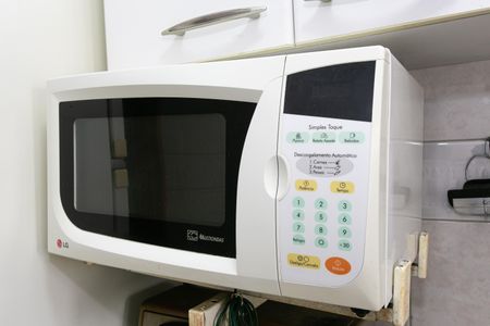 Apartamento à venda com 48m², 2 quartos e 1 vaga Apartamento à venda com 48m², 2 quartos e 1 vagaCozinha - Microondas