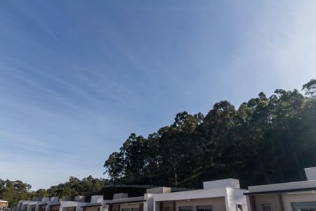 Casa de condomínio à venda com 230m², 3 quartos e 3 vagas Casa de condomínio à venda com 230m², 3 quartos e 3 vagasVista da Suíte 1