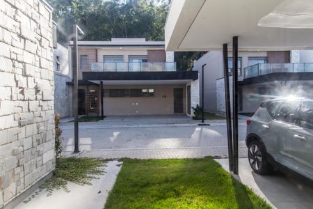 Casa de condomínio à venda com 230m², 3 quartos e 3 vagas Casa de condomínio à venda com 230m², 3 quartos e 3 vagasVista da Suíte 1