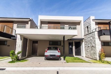 Casa de condomínio à venda com 230m², 3 quartos e 3 vagas Casa de condomínio à venda com 230m², 3 quartos e 3 vagasFachada e Placa