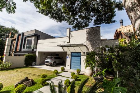 Casa de condomínio à venda com 350m², 4 quartos e 4 vagas Casa de condomínio à venda com 350m², 4 quartos e 4 vagasVista da Rua