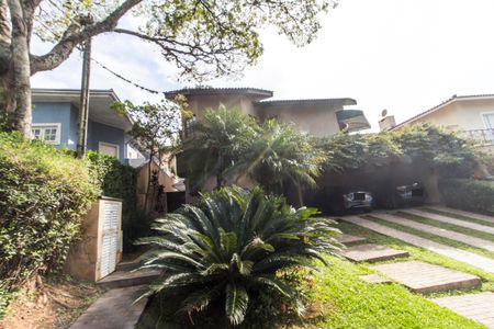 Casa de condomínio à venda com 320m², 4 quartos e 2 vagas Casa de condomínio à venda com 320m², 4 quartos e 2 vagasVista da Rua