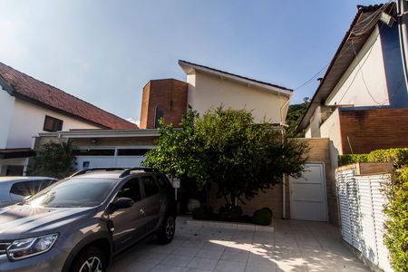 Casa de condomínio à venda com 390m², 4 quartos e 2 vagas Casa de condomínio à venda com 390m², 4 quartos e 2 vagasGaragem
