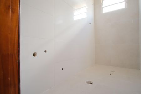 Casa de condomínio à venda com 58m², 2 quartos e 1 vagaBanheiro da Suíte 1