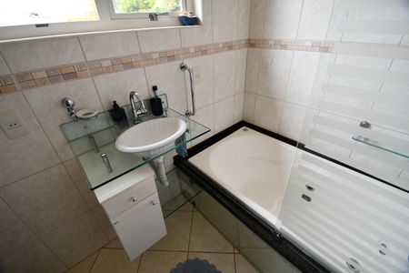 Casa à venda com 292m², 4 quartos e 1 vagaBanheiro da Suíte 2