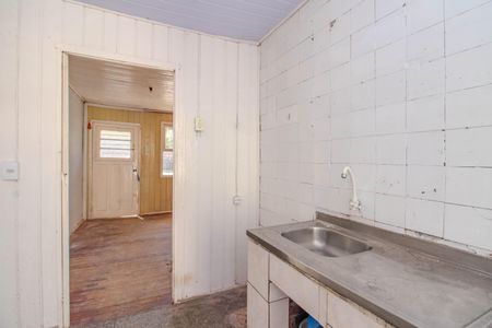 Casa à venda com 50m², 2 quartos e 2 vagas Casa à venda com 50m², 2 quartos e 2 vagasCozinha